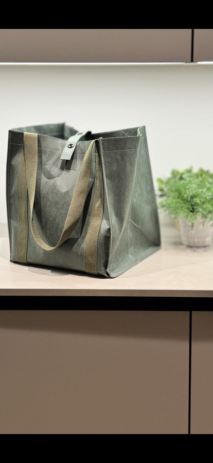 Stort handlenett eller handlebag i fargen grønn.